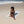 Femme allongée sur une fouta de plage couleur sahara - BY FOUTAS