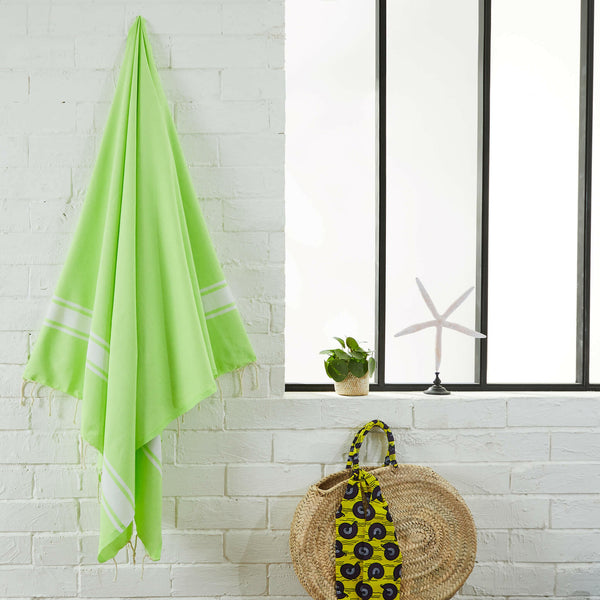fouta flat weave color granny hanging in a bathroom - BY FOUTAS