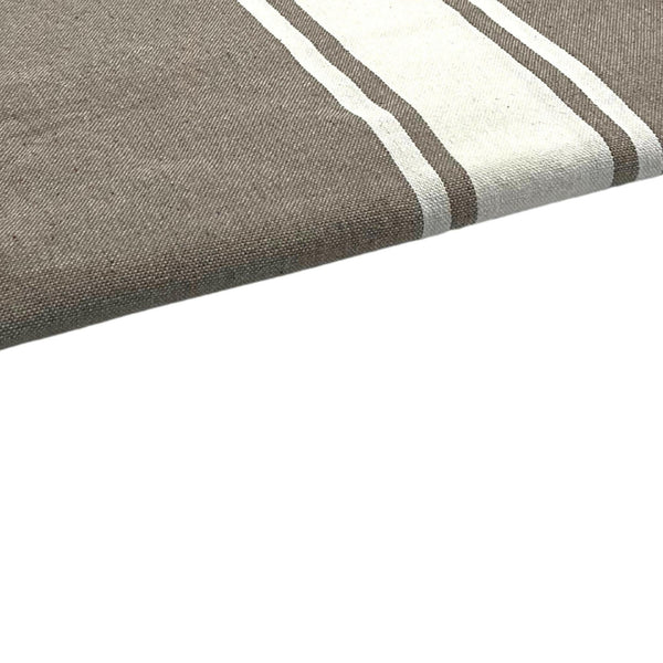 zoom on the beach fouta flat weave color taupe - BY FOUTAS
