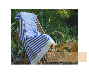 fouta mariniere ocean blue on a rocking chair