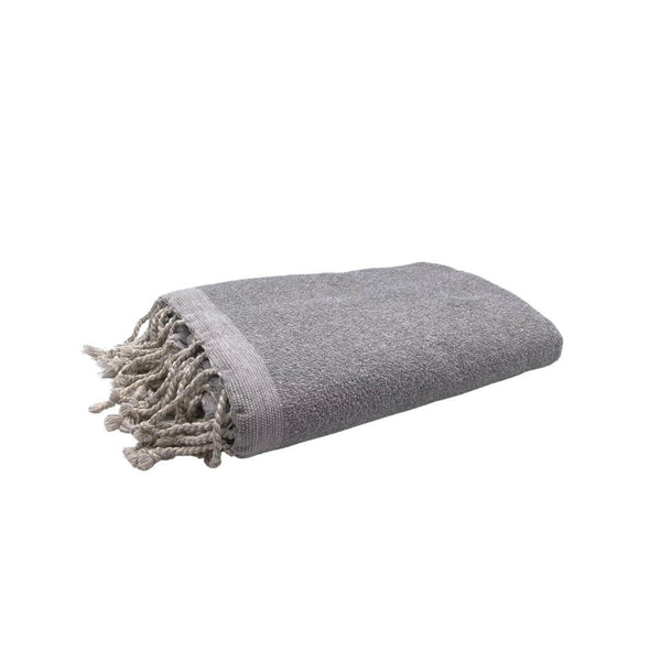 fouta Eponge unie couleur gris calcé pliée façon serviette de bain côté éponge - BY FOUTAS