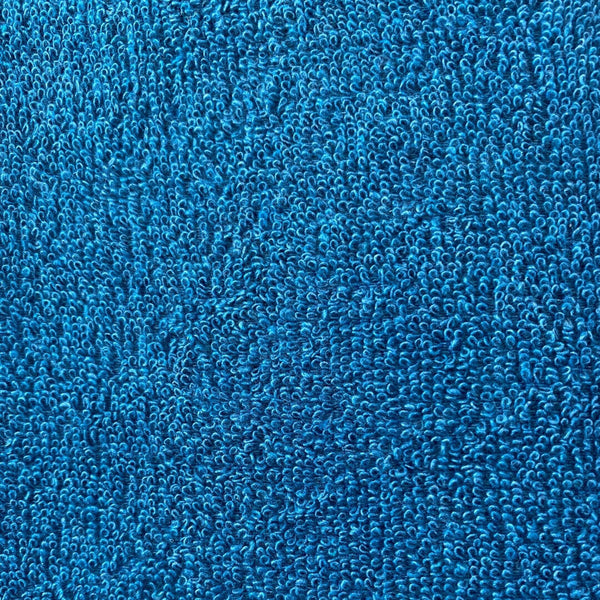 zoom sur la fouta de bain Eponge unie couleur bleu canard  - BY FOUTAS