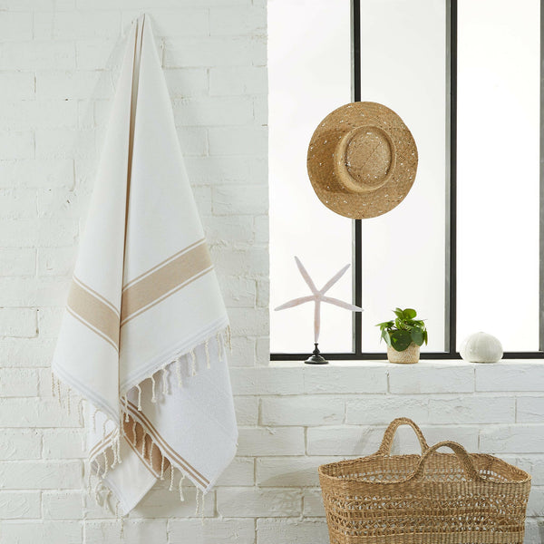 fouta Sponge color sahara hanging in a bathroom - BY FOUTAS