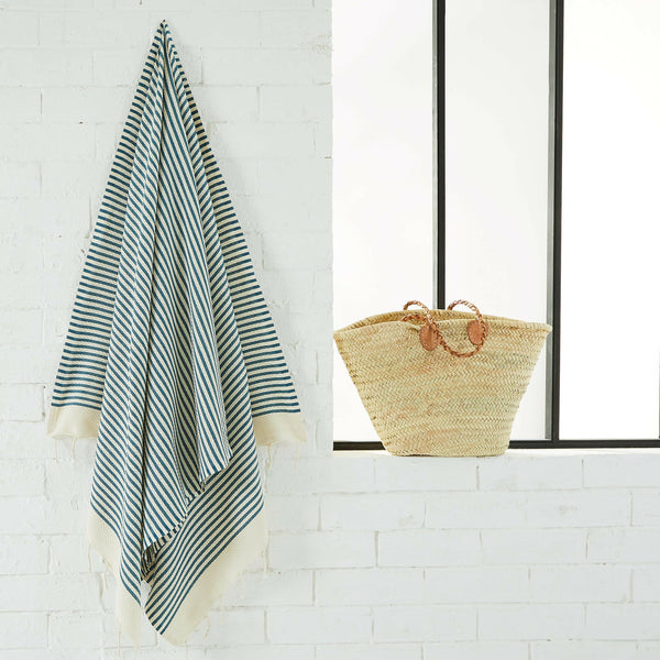 fouta mariniere duck blue color hanging in a bathroom - BY FOUTAS