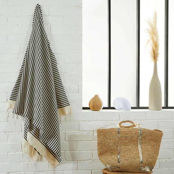 fouta mariniere navy blue color hanging in a bathroom - BY FOUTAS