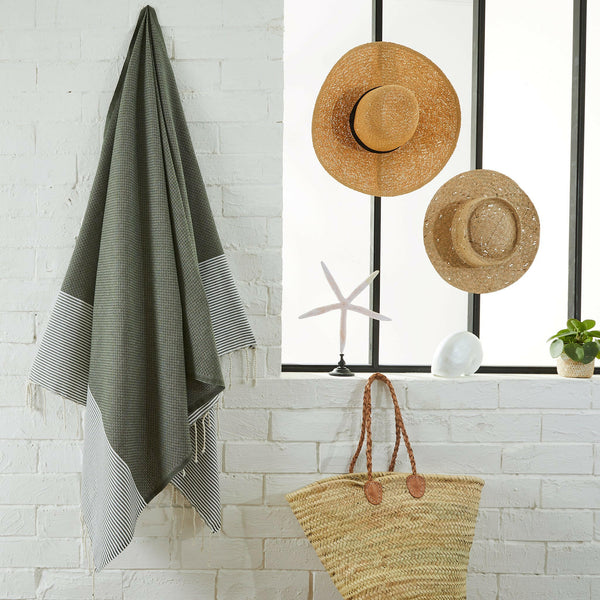 fouta Honeycomb olive color hanging in a bathroom - BY FOUTAS