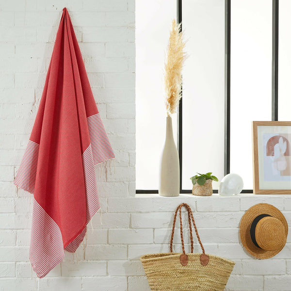 fouta Honeycomb red color hanging in a bathroom - BY FOUTAS