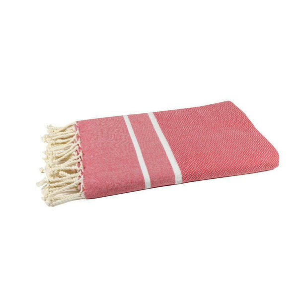 fouta Chevron couleur coquelicot pliée façon serviette de plage - BY FOUTAS