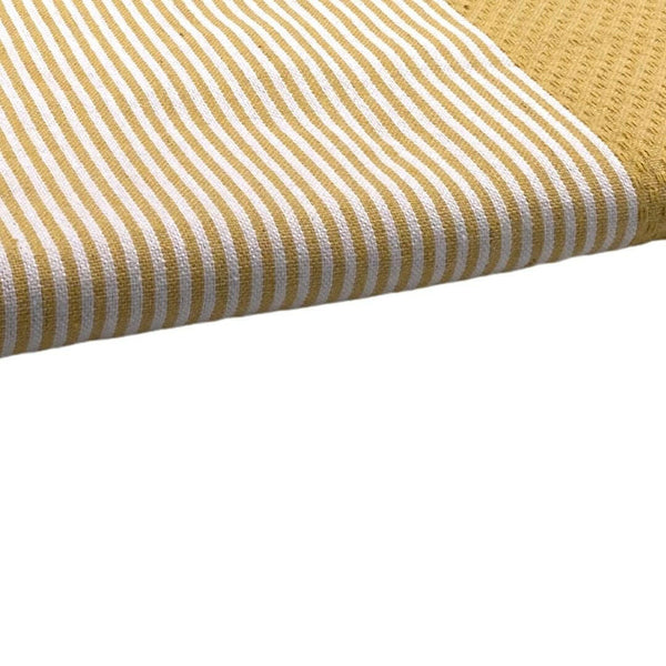 zoom on the beach fouta Honeycomb color mustard yellow - BY FOUTAS