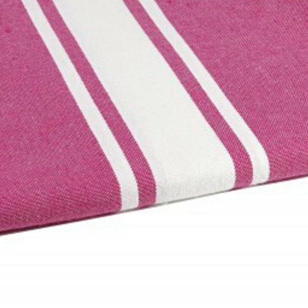 zoom on the beach fouta flat weave fuchsia color - BY FOUTAS