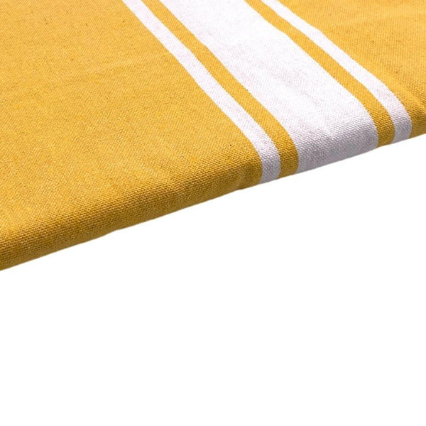 zoom on the beach fouta flat weave mustard yellow color - BY FOUTAS