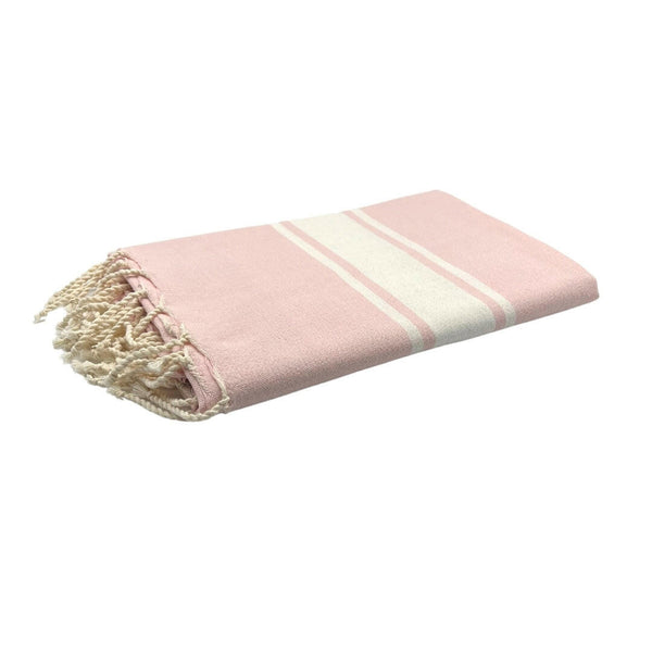 fouta Tissage plat couleur rose bébé pliée façon serviette de plage - BY FOUTAS