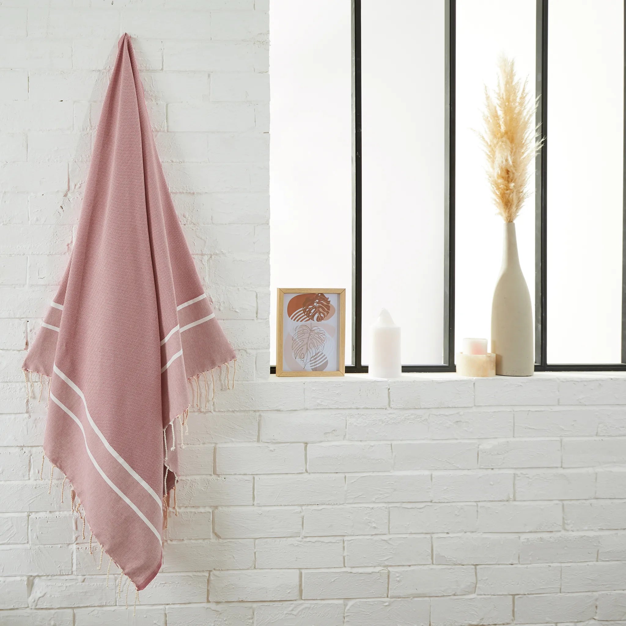 Woman using a Powder Pink Chevron Fouta - BY FOUTAS