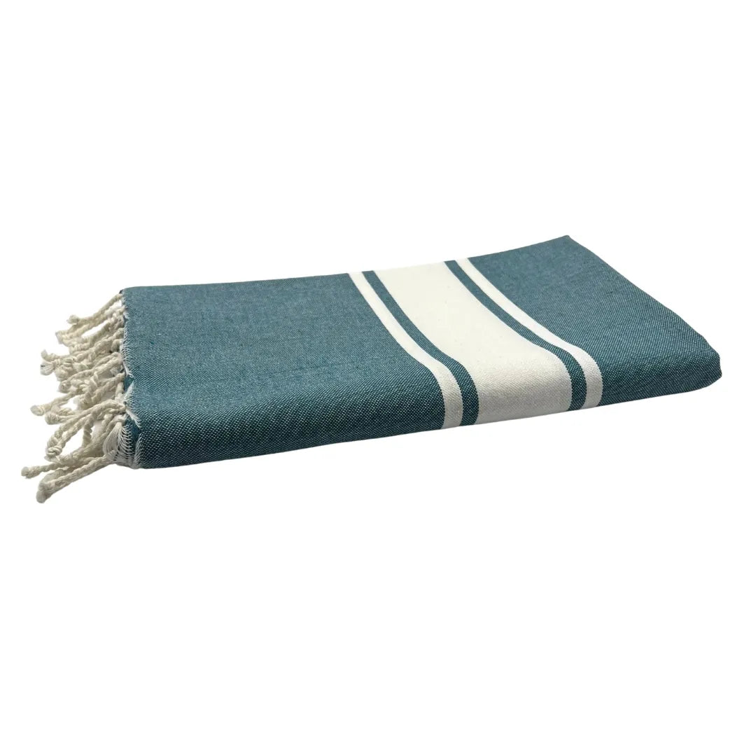 Classic Duck Blue Fouta hanging in a bathroom - BY FOUTAS