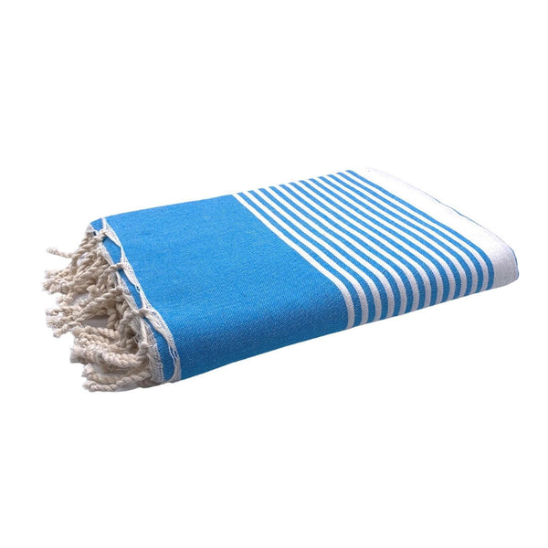 Arthur XXL fouta turquoise color folded beach towel XXL - BY FOUTAS